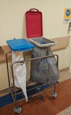 A garbage can on a cart
AI-generated content may be incorrect.